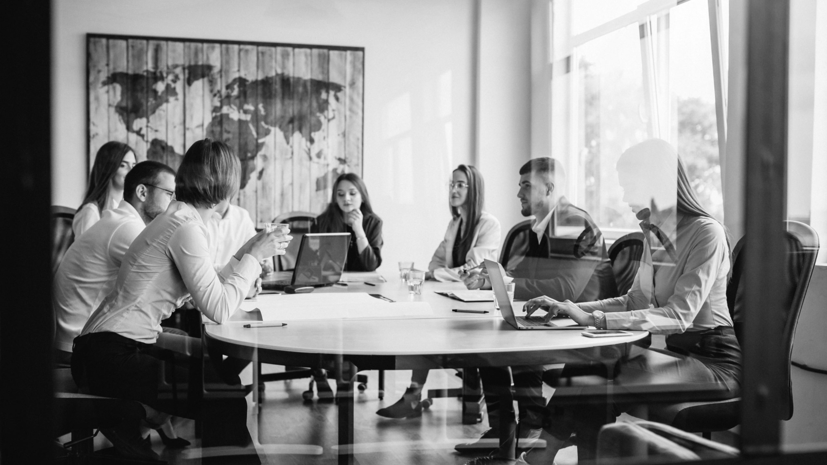 Group of people working out business plan in an office